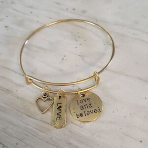 Bracelets by Sandra gold tone adjustable, love